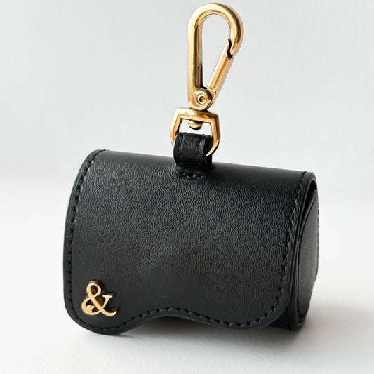 Poop bag holder in black leather