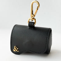 Poop bag holder in black leather